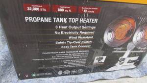 lot 75 image: Remington 32,000 BTU Double Head Tank Top Heater