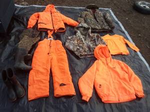 lot 3 image: Youth Camo and Blaze Orange Hunting Clothes, Hip Waders and Rubber Boots