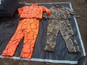 lot 7 image: Blaze Orange and Camo Hunting Clothes size 23XL