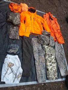 lot 8 image: Blaze Orange and Camo Hunting Clothes size 23XL