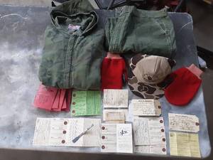 lot 20 image: Vintage Hunting Clothes and Licenses, Stamps, And Metal Deer Tags from 1960s
