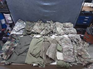 lot 24 image: Military Uniforms Pants, Shirts, Jackets, and Bag Sizes Medium