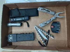 lot 59 image: Vipertek Tazer, Muti Tool, Butterfly Knife, and Flashlights