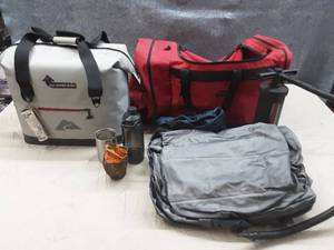 lot 68 image: Ozark trail soft cooler, air mattress with hand pump, large duffle bag.