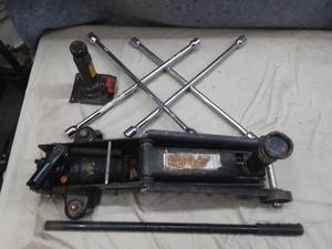 lot 85 image: floor Jack and 2 tire Irons