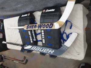 lot 105 image: Hockey Pads and Sticks