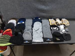 lot 123 image: Approximately 40 Stocking Caps and assorted gloves and masks
