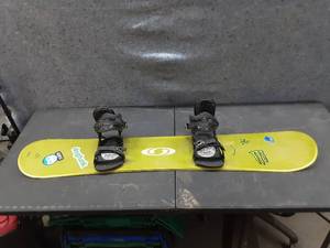 lot 138 image: Salomon Snowboard with Ride bindings 59