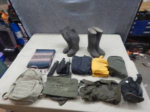 lot 35 image: Rubber Boots, Rain Jackets, Umbrellas, Dry Bags, Blanket and Backpack