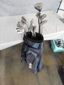 lot 104 image: Dunlop, PureSpin and other Golf Clubs with IZZO bag