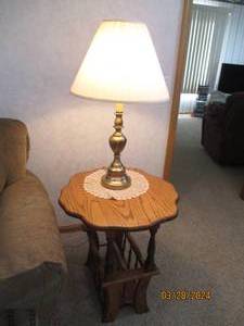 lot 16 image: Sturdy wood drop leaf magazine rack end table with brassctobe table lamp