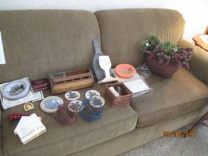 lot 22 image: Fun faux winter greens centerpiece with an assortment of decor