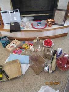 lot 27 image: Assortment of decor, personal care and supplies for the home