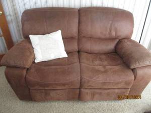 lot 35 image: Crushed Microfiber style Dual end reclining loveseat with a suede look