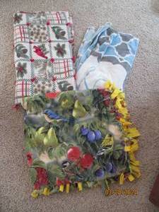 lot 37 image: Trio of soft and warm personal blankets