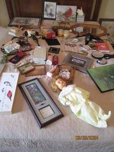 lot 55 image: Variety lot of personal care supplies, wall and shelf decor and vintage doll