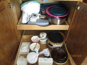 lot 70 image: Cupboard content consisting of mixing bowls, glass bakeware and a variety of small electric kitchen appliances and aids