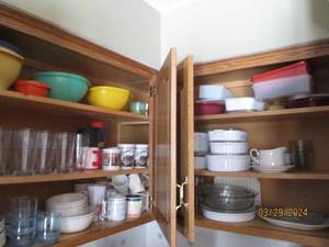 lot 71 image: Kitchen cupboards of fun including Cups, mugs, plates, saucers bowls and more