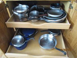 lot 76 image: Large collection of kitchen cookware pan variety and lids