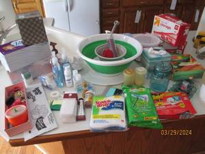 lot 81 image: Countertop collection of personal care needs and supplies, office supplies and other goodies