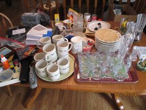 lot 82 image: Huge variety lot from Christmas mugs and serving pieces to misc cut and etched glassware and office supplies