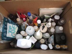 lot 83 image: Big box of Bath and Body Works Body Sprays and lotions plus other personal care needs and supplies