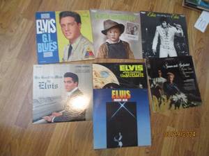 lot 91 image: Handful of Vinyl Record Albums from artists such as Simon and Garfunkel and Elvis