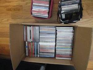 lot 96 image: Collection of music and other CDS from artists such as Reba McEntire, Neil Diamond, Abba and more