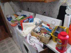 lot 102 image: Huge variety of laundry room detergents, 1st aid supplies, cleaning cloths and more