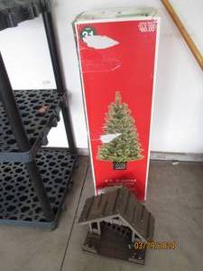 lot 111 image: 4ft lit potted Virginia Pine tree in box plus wooden Nativity structure
