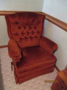 lot 136 image: Deep rust tone padded rocking Recliner