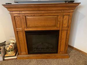 lot 208 image: Corner Wood fireplace and heat insert