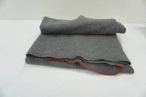lot 10 image: Wool Gray and Red Trim Blanket