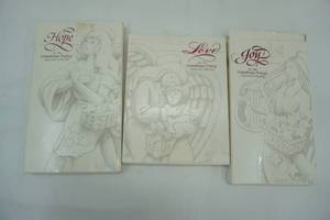 lot 11 image: 3 Longaberger Pottery Angel Molds