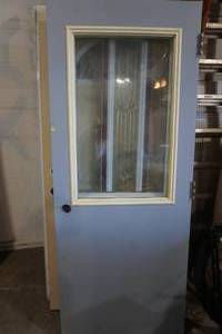 lot 214 image: 32 steel exterior door with hinges, half glass, gray
