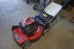 lot 210 image: Toro 159CC 22 inch deck Lawn Mower, gas, personal pace, and bag