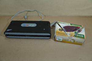 lot 13 image: Ziplok Vacuum Sealer with Quart Size Bags