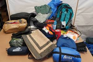 lot 153 image: Large Assortment Camping Gear -Air Mattresses, Backpacks, Ponchos