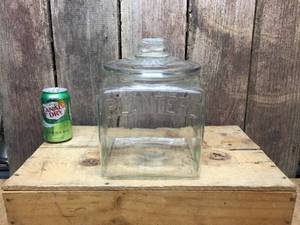 lot 14 image: Vintage PLANTERS Embossed Glass ContainerJar