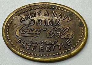 lot 38 image: Coca Cola Brass Token