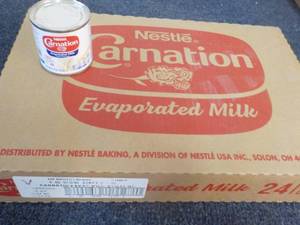 lot 83 image: 24 x 5 oz cans Nestle Carnation Evaporated Milk past best date