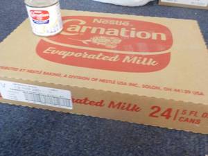 lot 85 image: 24 x 5 oz cans Nestle Carnation Evaporated Milk past best date