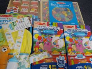 lot 87 image: New Melissa and Doug Toys...