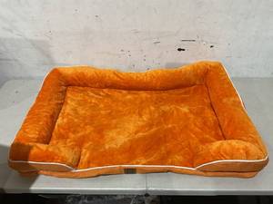 lot 524 image: Large Orange Dog Bed, Measures 42 x 25
