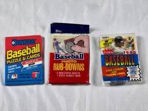 lot 148 image: Lot of 3 Unopened Packs - 1989 Diamond Kings, 1990 Fleer, 1984 Topps Rub Downs