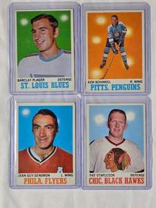 lot 204 image: Lot of 4 1970 Topps NHL Hockey Cards Barclay Plager No. 99, Ken Schinkel No. 92, Jean Guy Gendron No. 86, Pat Stapleton No. 17