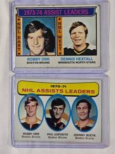 lot 219 image: Lot of 2 70s NHL Hockey Cards 1970-71 Assist Leaders Orr, Esposito, Bucyk & 1973-74 Assist Leaders Orr, Hextall
