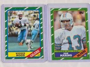 lot 287 image: Lot of 2 1986 Topps - Warren Moon No. 350, Dan Marino No 45