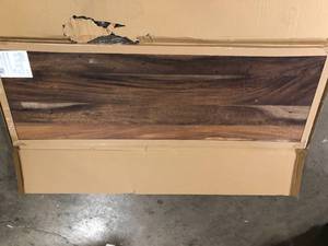 lot 6 image: Hampton Bay 6 ft. L x 25 in. D Finished Saman Solid Wood Butcher Block Countertop With Live Edge  Customer Returns See Pictures
