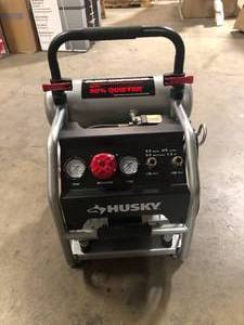 lot 10 image: Husky 4.5 Gal. Portable Electric-Powered Silent Air Compressor Customer Returns See Pictures